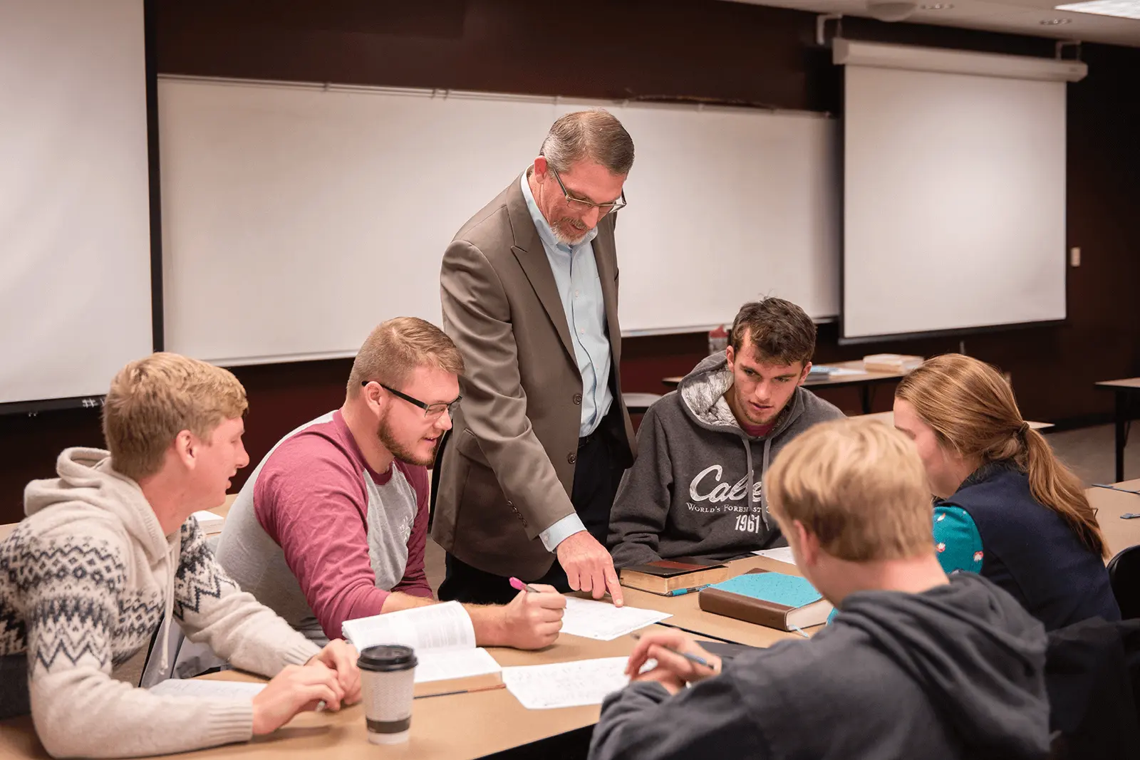 IWU professor with students