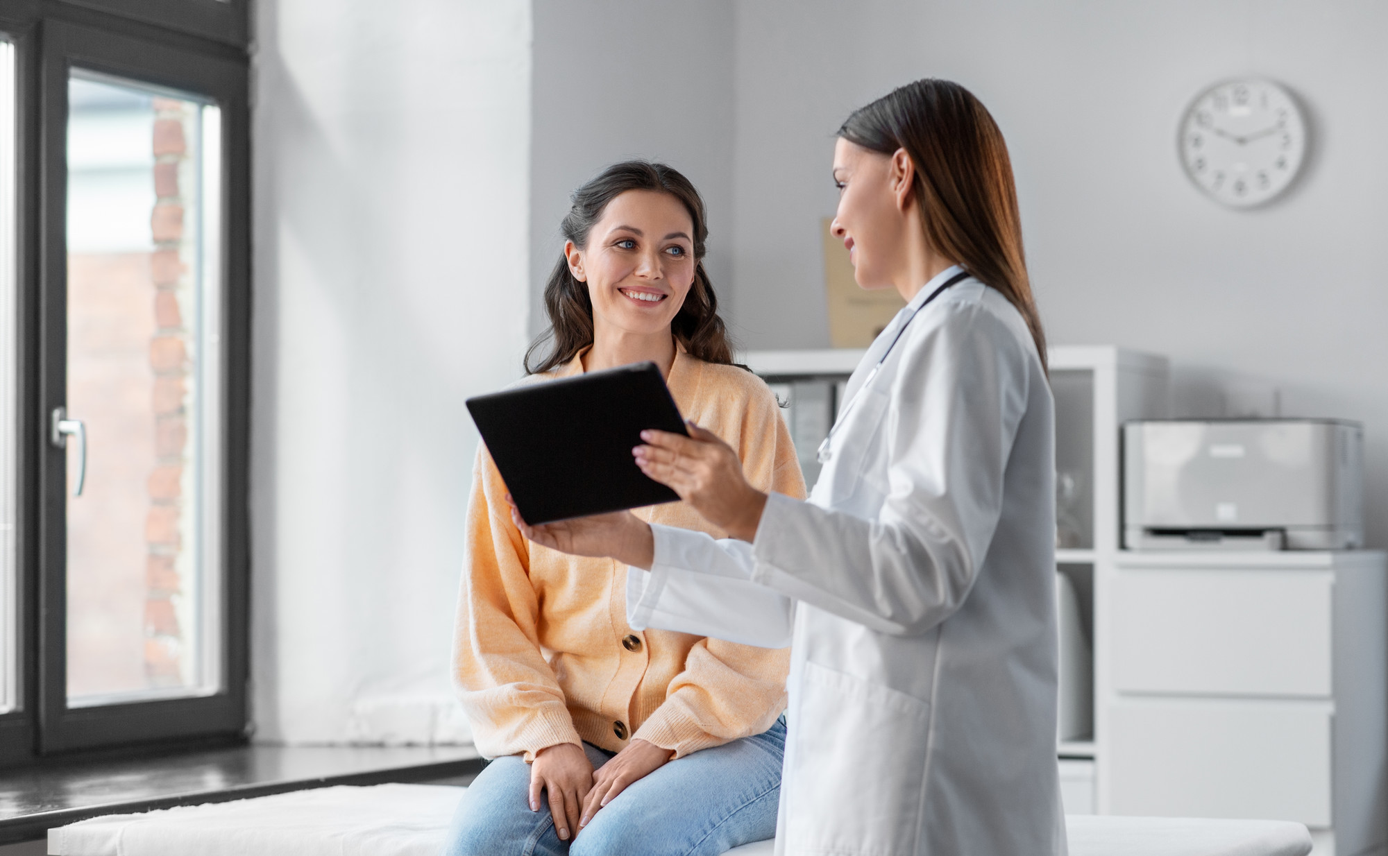 Nurse talking to patient