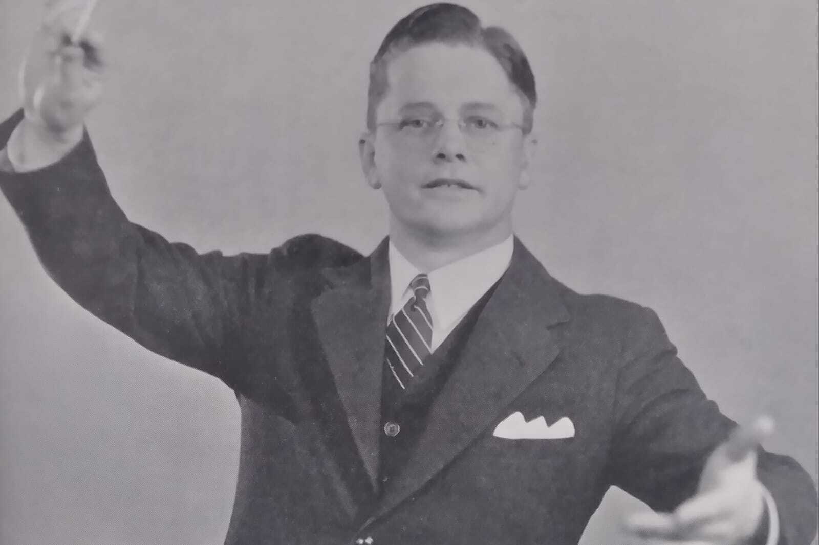 Herman directing music