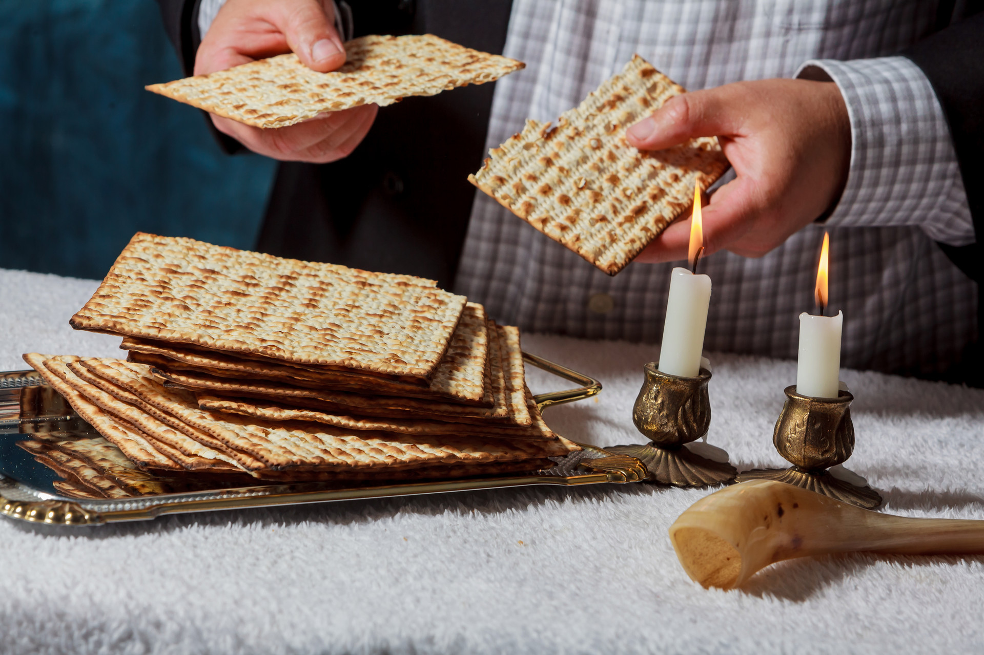 Priest breaking matzah