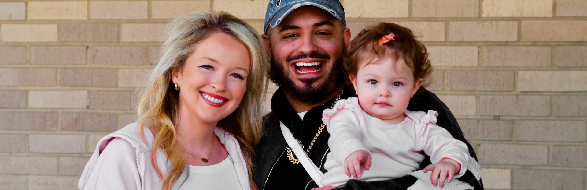 Joseph Madigan with wife and daughter